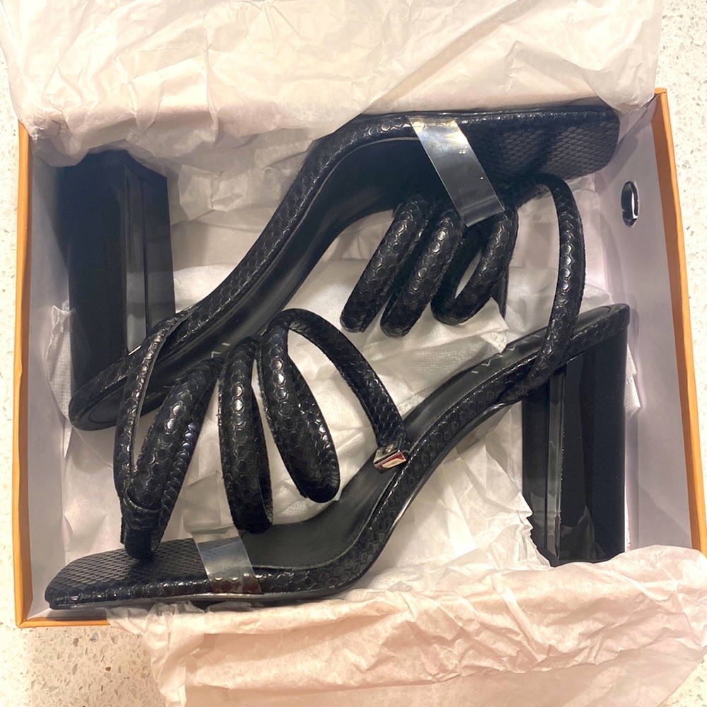 Size 10, 3 Inch heels. Black snake print.